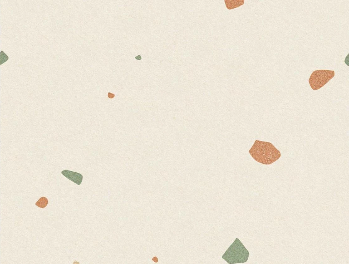 A square terrazzo texture: warm white background with scattered terracotta and sage green chips